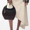 Bolso Squeeze pequeño en piel de becerro napa tejida