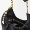 Bolso Squeeze pequeño en piel de becerro napa tejida