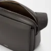 Bolso tipo bandolera Pebble mediano en piel de becerro lisa Bolso tipo bandolera Pebble mediano en piel de becerro lisa