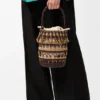 Bolso tipo cubeta de cordón y cuero Bolso tipo cubeta de cordón y cuero
