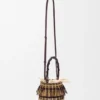 Bolso tipo cubeta de cordón y cuero Bolso tipo cubeta de cordón y cuero