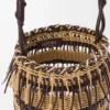 Bolso tipo cubeta de cordón y cuero Bolso tipo cubeta de cordón y cuero