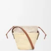 Bolso tipo cubo con cordón de hoja de palma y piel de becerro Bolso tipo cubo con cordón de hoja de palma y piel de becerro