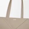 Bolso tipo tote mediano con pliegue Puzzle Fold horizontal en piel de becerro de grano suave Bolso tipo tote mediano con pliegue Puzzle Fold horizontal en piel de becerro de grano suave