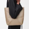 Bolso tote mediano Puzzle Fold en piel de becerro brillante