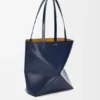 Bolso tote mediano Puzzle Fold en piel de becerro brillante Bolso tote mediano Puzzle Fold en piel de becerro brillante