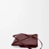 Bolso tote mediano Puzzle Fold en piel de becerro brillante
