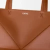 Bolso tote mediano Puzzle Fold en piel de becerro brillante Bolso tote mediano Puzzle Fold en piel de becerro brillante