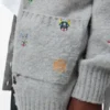 Cardigan de lana con cinturón Cardigan de lana con cinturón