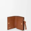 Cartera compacta con el nodo de Loewe en piel de becerro napa brillante Cartera compacta con el nodo de Loewe en piel de becerro napa brillante