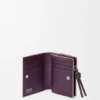 Cartera compacta con el nodo de Loewe en piel de becerro napa brillante Cartera compacta con el nodo de Loewe en piel de becerro napa brillante