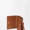 Cartera compacta con el nodo de Loewe en piel de becerro napa brillante Cartera compacta con el nodo de Loewe en piel de becerro napa brillante