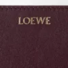 Cartera compacta con el nodo de Loewe en piel de becerro napa brillante Cartera compacta con el nodo de Loewe en piel de becerro napa brillante