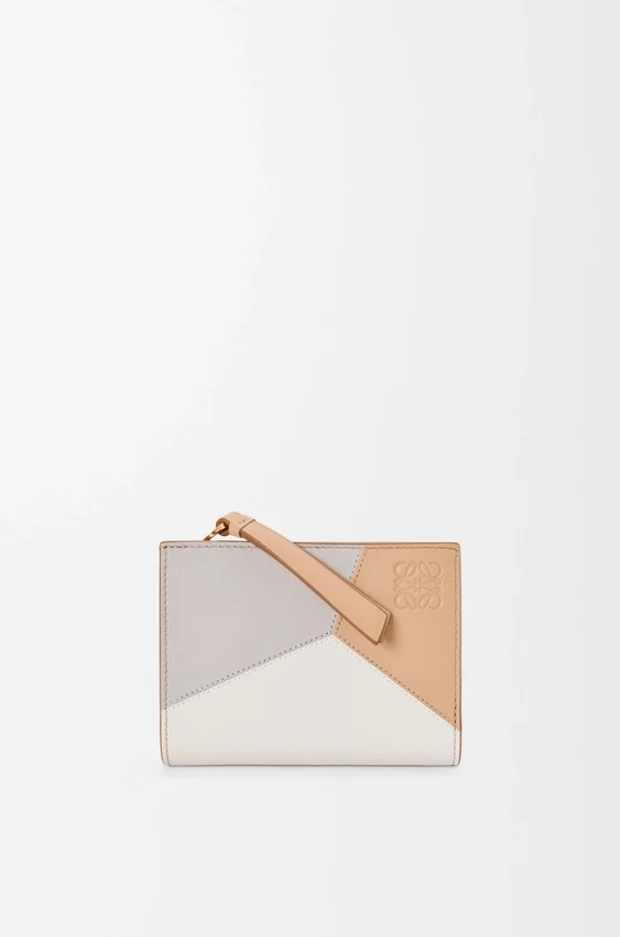 Cartera compacta Puzzle en piel de becerro clásica Cartera compacta Puzzle en piel de becerro clásica