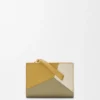 Cartera compacta Puzzle en piel de becerro clásica Cartera compacta Puzzle en piel de becerro clásica
