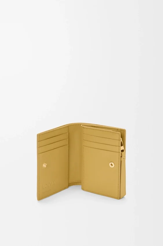 Cartera compacta Puzzle en piel de becerro clásica Cartera compacta Puzzle en piel de becerro clásica