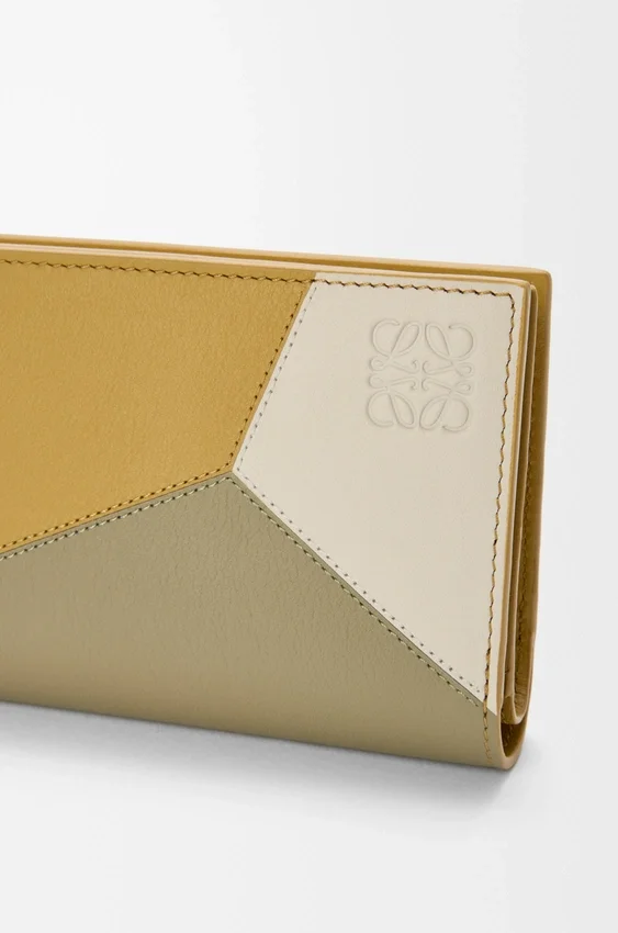 Cartera compacta Puzzle en piel de becerro clásica Cartera compacta Puzzle en piel de becerro clásica