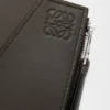 Cartera compacta y delgada Puzzle en piel de becerro clásica Cartera compacta y delgada Puzzle en piel de becerro clásica