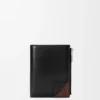 Cartera compacta y delgada Switch en piel de becerro granulada flexible y gamuza Cartera compacta y delgada Switch en piel de becerro granulada flexible y gamuza