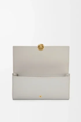 Cartera Continental Pebble en piel de becerro napa brillante