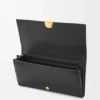 Cartera Continental Pebble en piel de becerro napa brillante Cartera Continental Pebble en piel de becerro napa brillante