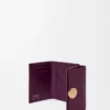 Cartera de tres pliegues «Pebble» en piel de becerro con textura «Pebble» Cartera de tres pliegues «Pebble» en piel de becerro con textura «Pebble»