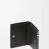 Cartera delgada y compacta en piel de becerro clásica texturizada
