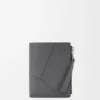 Cartera delgada y compacta Puzzle en piel de becerro granulada y flexible