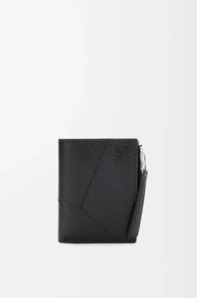 Cartera delgada y compacta Puzzle en piel de becerro granulada y flexible