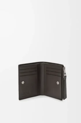 Cartera delgada y compacta Puzzle en piel de becerro granulada y flexible
