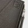 Cartera delgada y compacta Puzzle en piel de becerro granulada y flexible