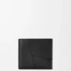 Cartera doble para monedas Puzzle en piel de becerro granulada y flexible