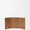 Cartera vertical pequeña en piel de becerro lisa y granulada Cartera vertical pequeña en piel de becerro lisa y granulada