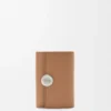 Cartera vertical pequeña «Pebble» en piel de becerro con textura «Pebble» Cartera vertical pequeña «Pebble» en piel de becerro con textura «Pebble»