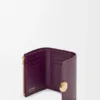 Cartera vertical pequeña «Pebble» en piel de becerro con textura «Pebble» Cartera vertical pequeña «Pebble» en piel de becerro con textura «Pebble»