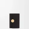 Cartera vertical pequeña «Pebble» en piel de becerro napa brillante