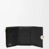 Cartera vertical pequeña «Pebble» en piel de becerro napa brillante