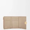 Cartera vertical pequeña «Pebble» en piel de becerro napa brillante Cartera vertical pequeña «Pebble» en piel de becerro napa brillante