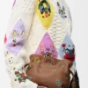 Cats Mini Flamenco Clutch en piel de becerro napa Cats Mini Flamenco Clutch en piel de becerro napa