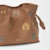 Cats Mini Flamenco Clutch en piel de becerro napa Cats Mini Flamenco Clutch en piel de becerro napa