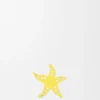 Dado con forma de estrella de mar en piel de becerro Dado con forma de estrella de mar en piel de becerro