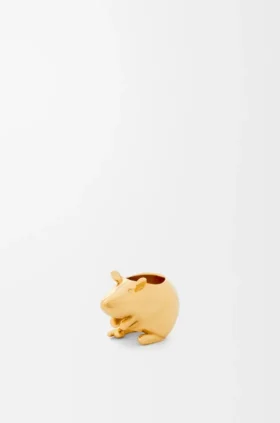 Dado pequeño con forma de animal de metal