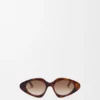 Gafas de sol delgadas con forma triangular Gafas de sol delgadas con forma triangular