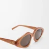 Gafas de sol delgadas con forma triangular