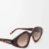 Gafas de sol delgadas con forma triangular Gafas de sol delgadas con forma triangular
