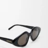 Gafas de sol delgadas con forma triangular Gafas de sol delgadas con forma triangular