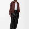 Pantalones con cinturón de piel de cordero napa
