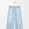 Pantalones con cordón de ajuste en denim Pantalones con cordón de ajuste en denim