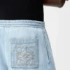 Pantalones con cordón de ajuste en denim Pantalones con cordón de ajuste en denim