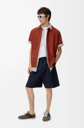 Pantalones cortos plisados de algodón y lino